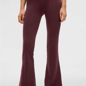 Lululemon Purple Wunder Under High-Rise Flare Pants.